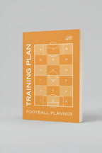 Football training plan planner with soccer field diagram on an orange cover against a gray background