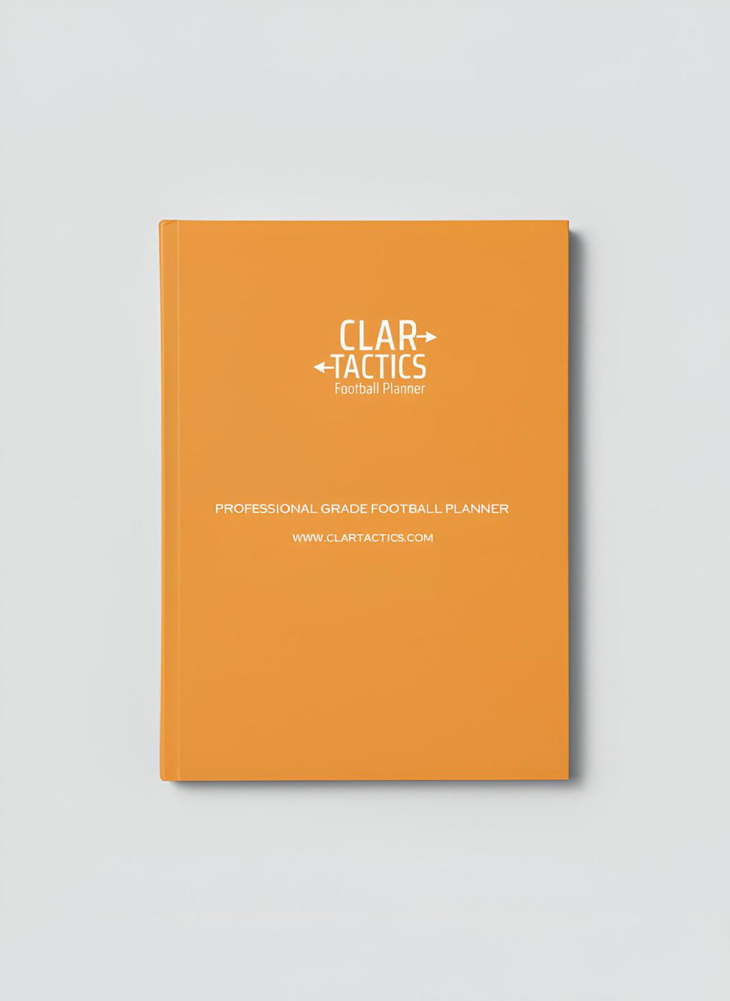 Orange planner with 'Clartactics' branding on a light gray background
